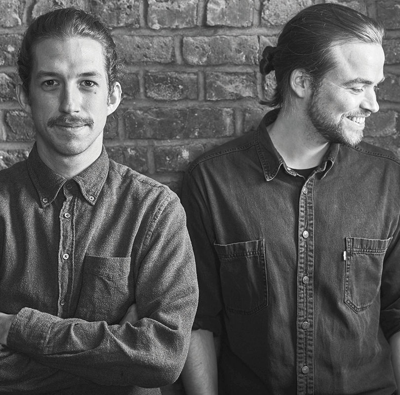 black and white portrait of Rahmlow Design founders, Aaron von Lüpke and Justus Leopold