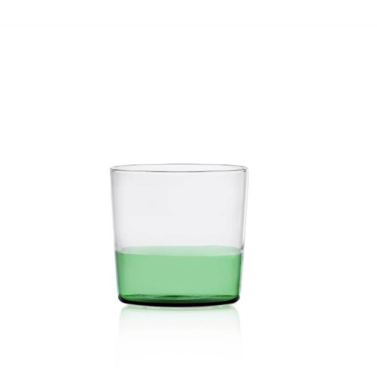 water tumbler with a green bottom half, designed by Alba Gallizia for Ichendorf Milano