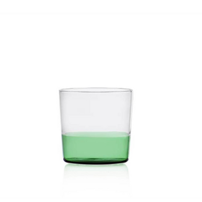 water tumbler with a green bottom half, designed by Alba Gallizia for Ichendorf Milano