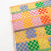 Odds and Ends multi cloth, checkered check design in primary and bright colours by Foekje Fleur, limited Edition number 18 with a striped edge