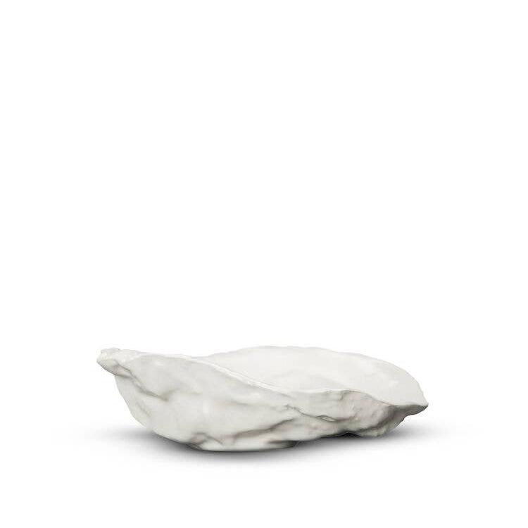 decorative bowl in the shape of an oyster shell